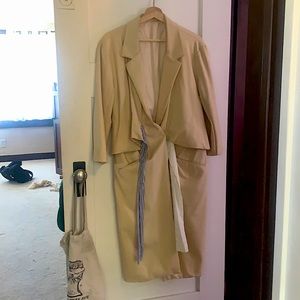 Belgian-style beige trench coat, super unique louche fit, gorgeous details